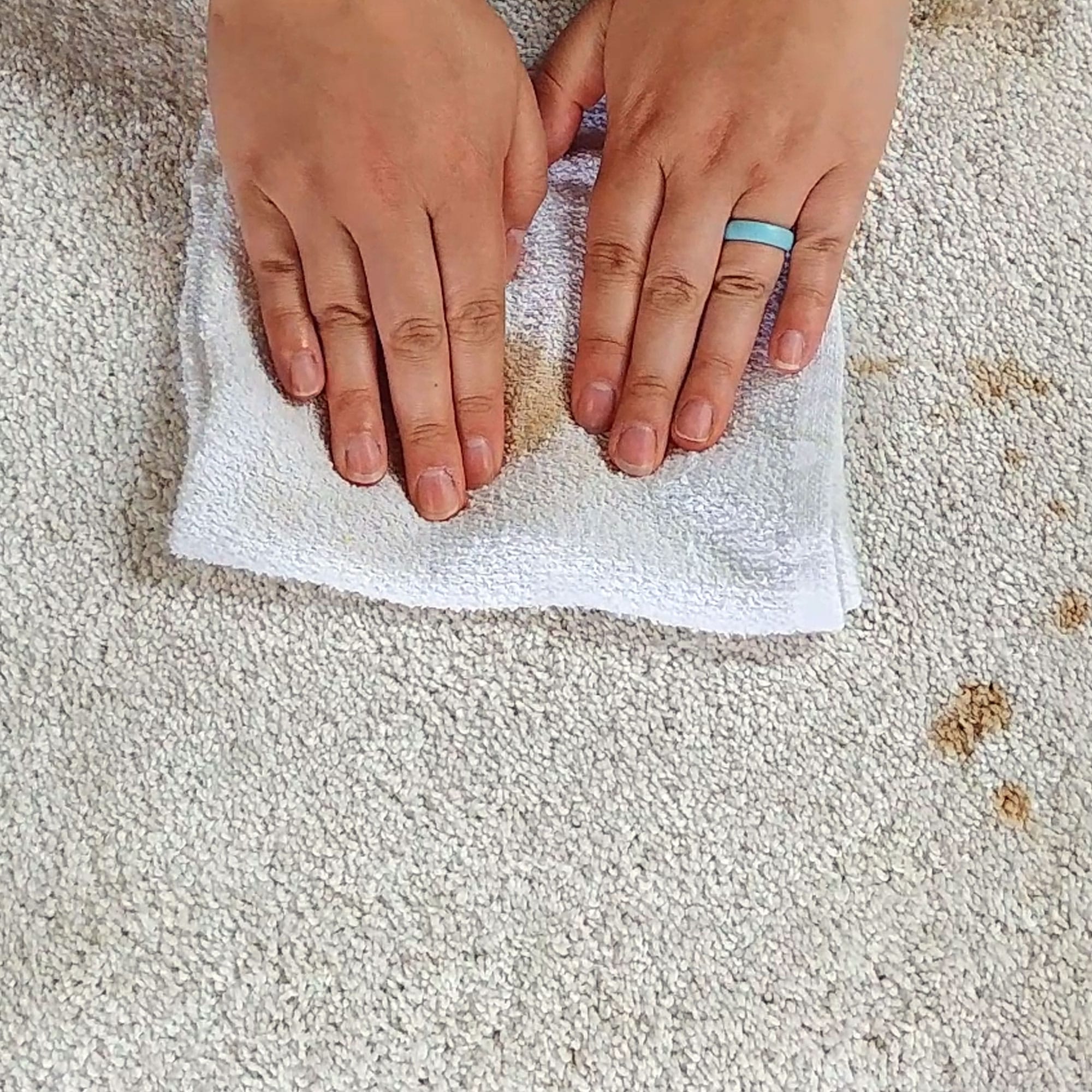 Blotting coffee with white towel